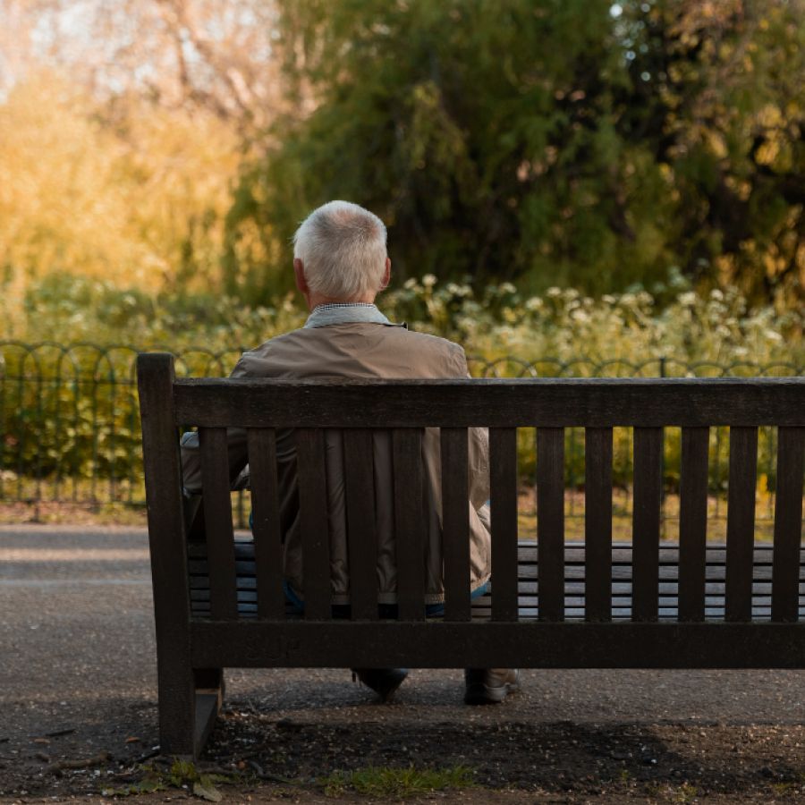 old man sitting on a bench